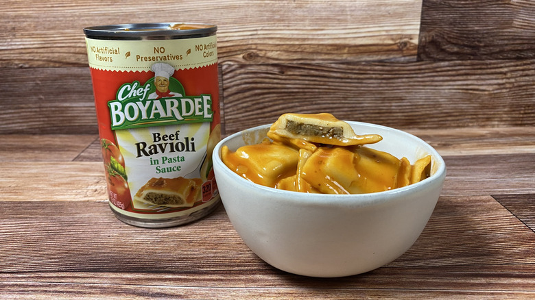 An open can and a bowl of Chef Boyardee Beef Ravioli