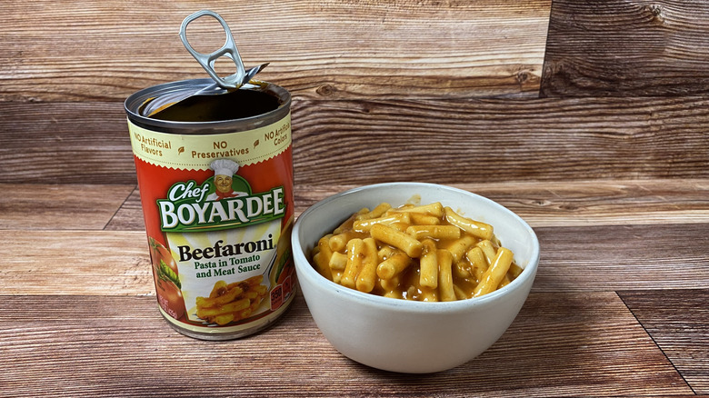 An open can and a bowl of Chef Boyardee Beefaroni