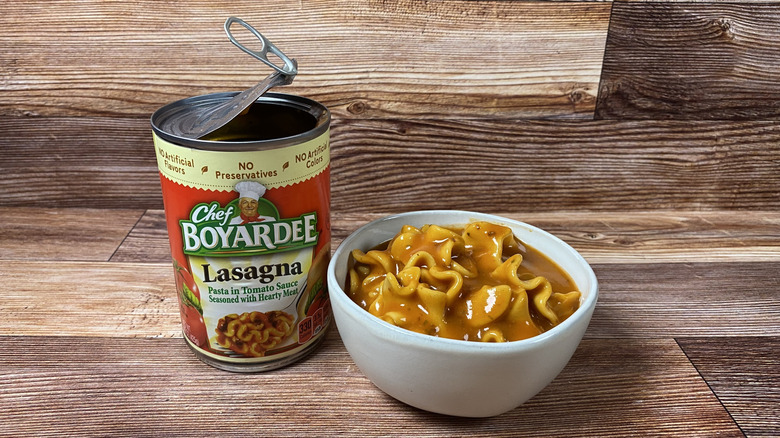An open can and a bowl of Chef Boyardee Lasagna