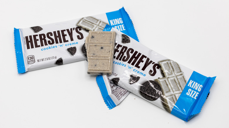 Two Hershey's Cookies 'n' Creme bars on white background