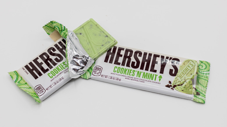Two Hershey's Cookies 'n' Mint bars on white background
