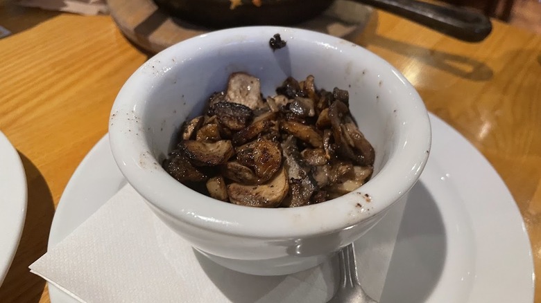 A bowl of garlic butter mushrooms from Chili's