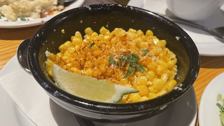A plate of loaded street corn from Chili's