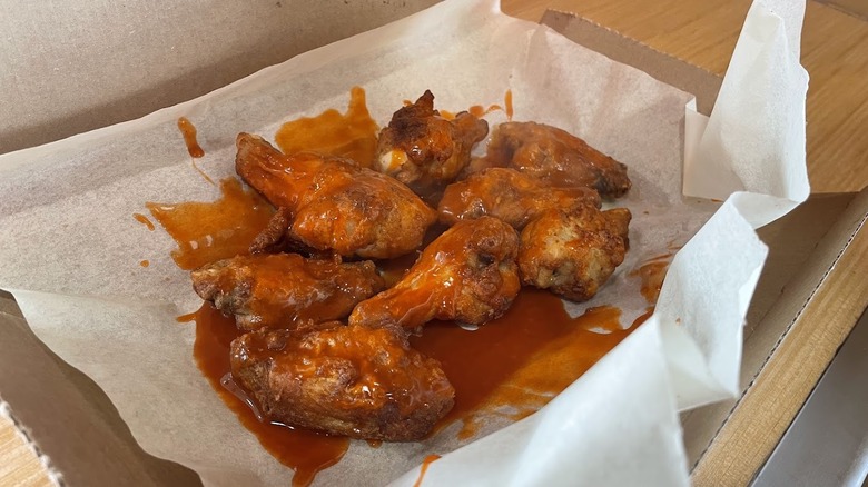 A box of Buffalo wings from Domino's.