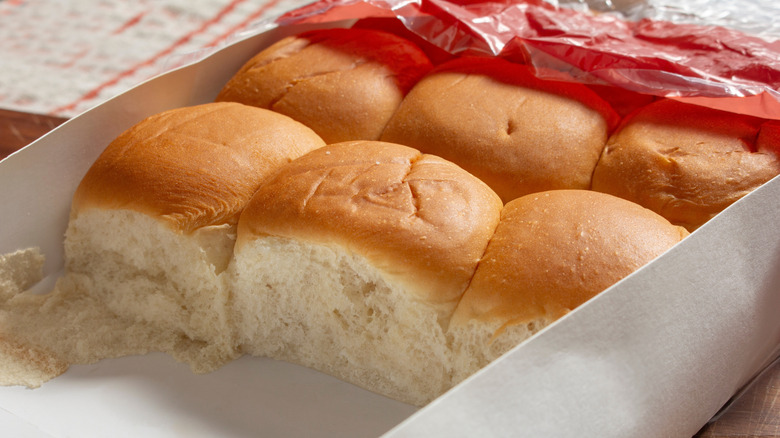Rows of Hawaiian rolls displayed in a box