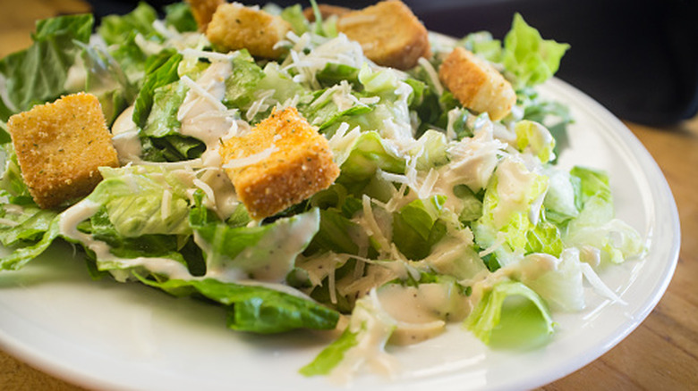 A plate of Caesar salad