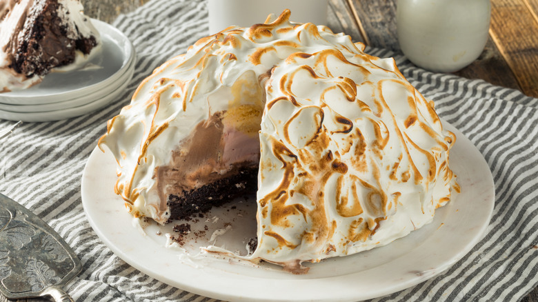Plate of Baked Alaska with a slice missing