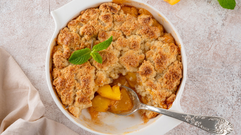 A bowl of peach cobbler