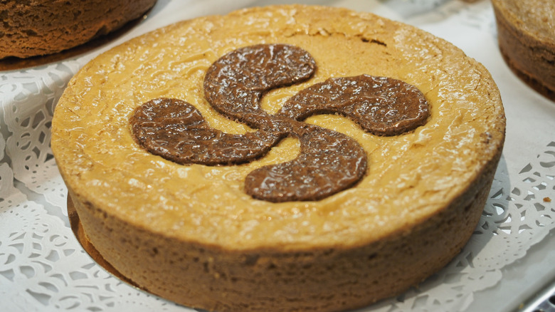 Basque cake with a Basque cross decoration