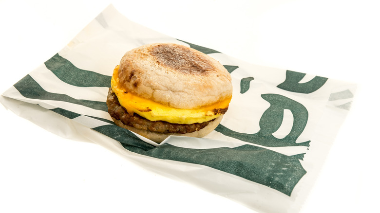 a Starbucks breakfast sandwich on a starbucks bag