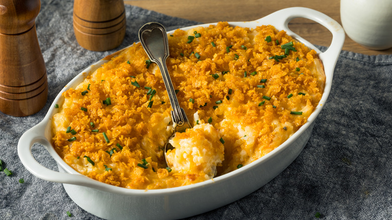 A crock of creamy chicken casserole with buttery Ritz cracker topping.