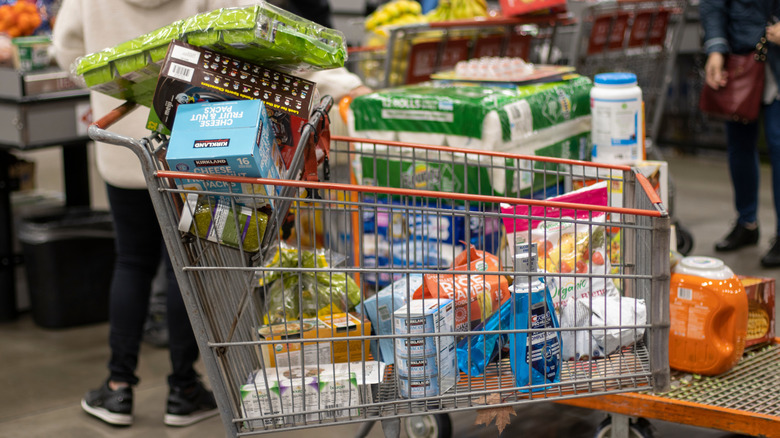 A Costco shopping cart filled with groceries