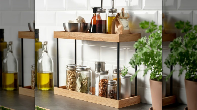 NÅLBLECKA Kitchen Counter Organizer filled with spices, herbs, and sauces