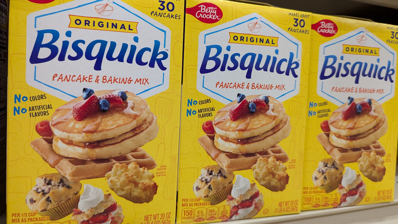 Boxes of Bisquick on a shelf at a grocery store