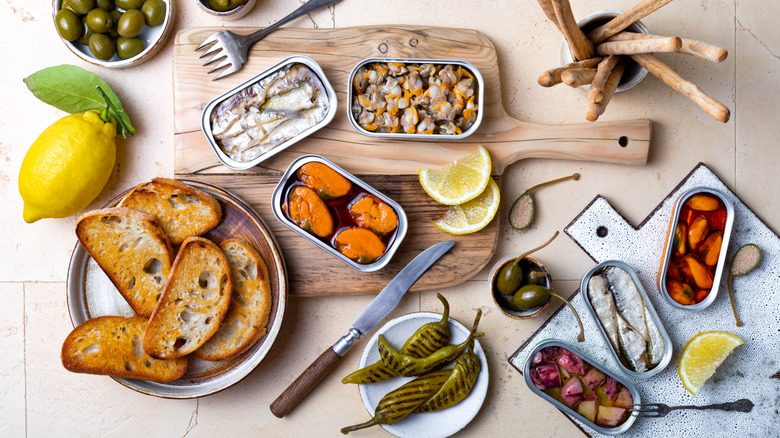 A charcuterie-style board is made with fish.