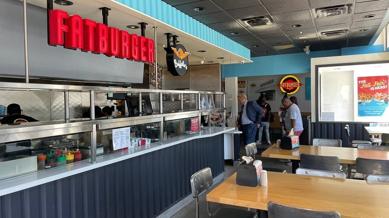 Interior of a Fatburger restaurant.
