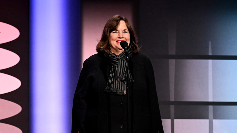 Celebrity chef Ina Garten stands on stage at an event.