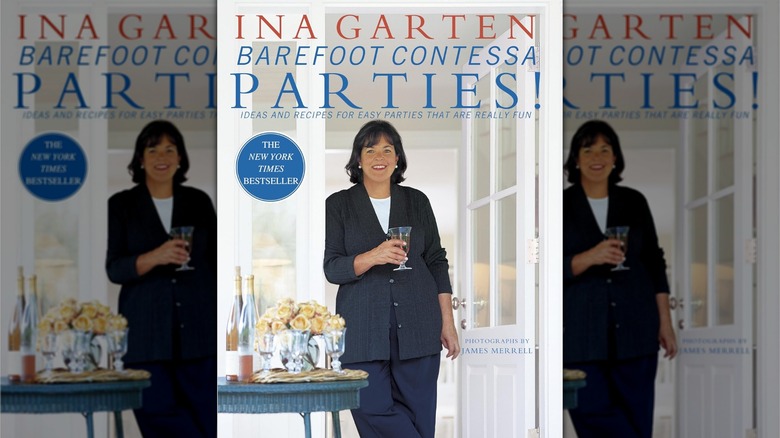 Book cover for Barefoot Contessa Parties!, showing Ina Garten holding a glass while standing by a table and smiling