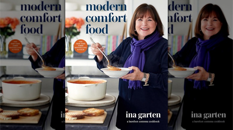 Book cover for Modern Comfort Food, showing Ina Garten ladling tomato soup into a white bowl