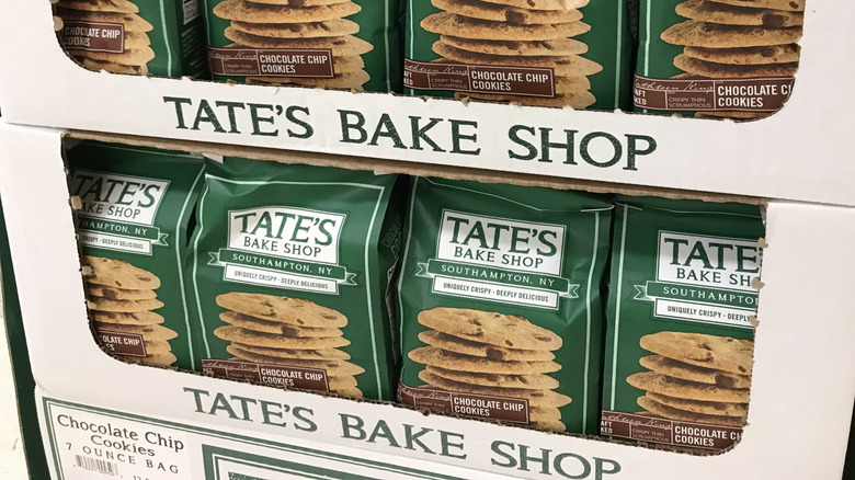 A store display of packages of Tate's Bake Shop chocolate chip cookies