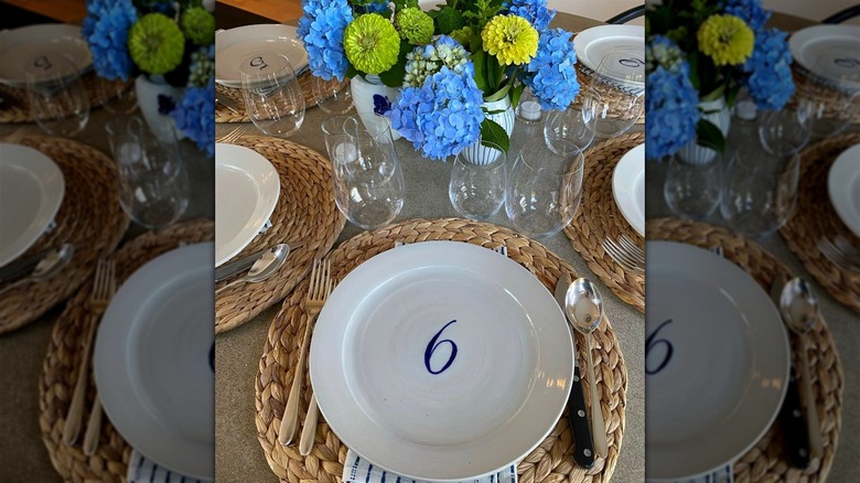 Ina Garten's summer table setting featuring numbered dinner plates