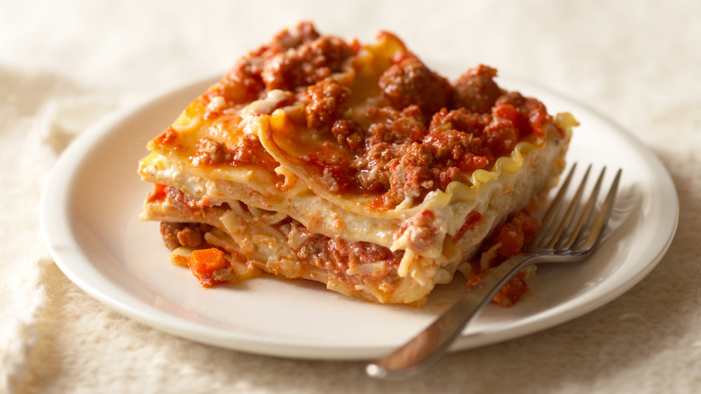 Turkey lasagna on plate with fork