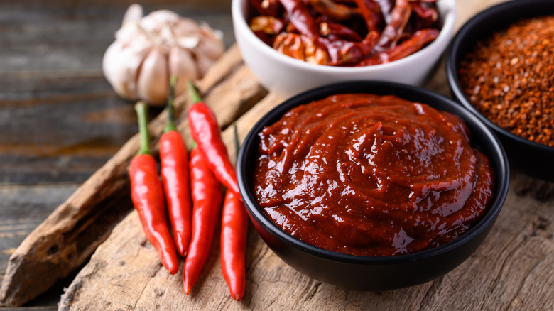 Bowl of gochujang and chilis