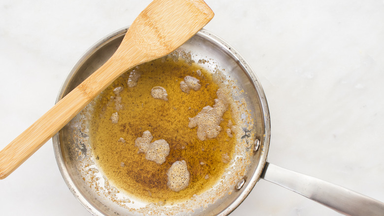 Melted brown butter in a skillet