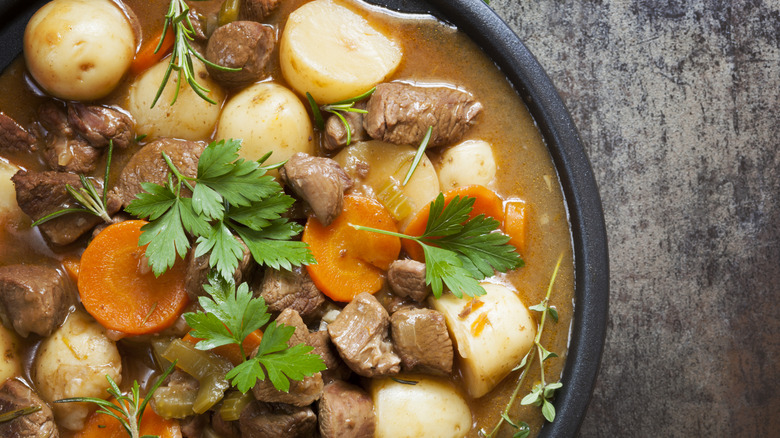 A pot of Irish stew with lamb and potatoes