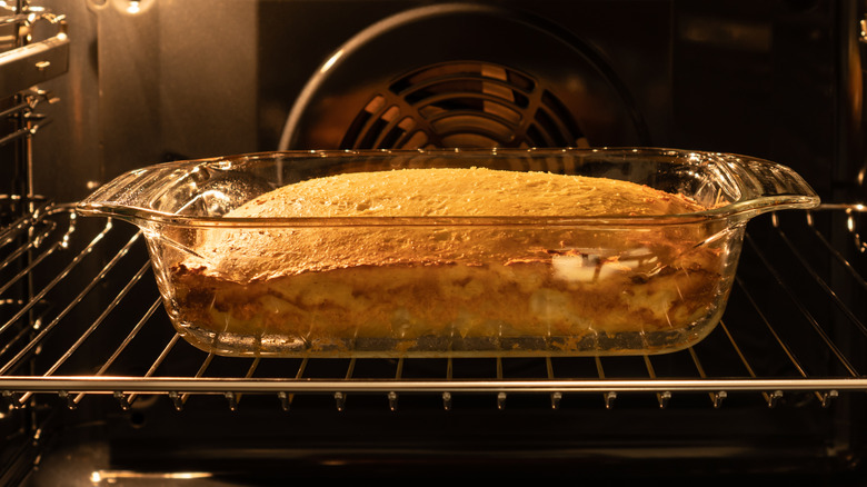 A glass pan baking in the oven