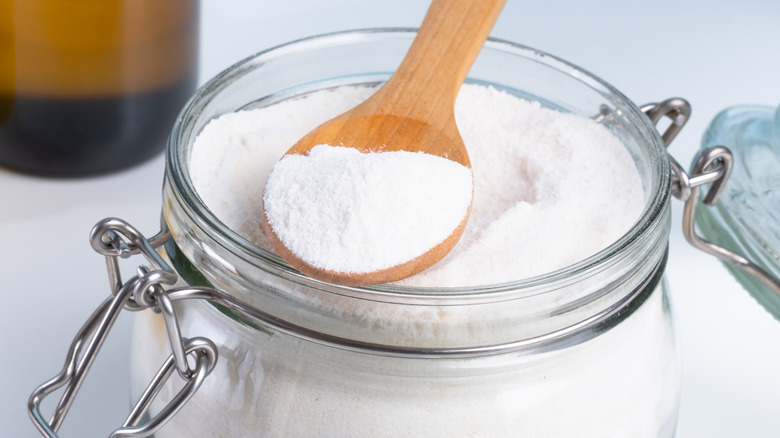 Baking soda in a jar with a spoon