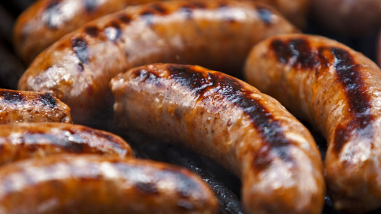 Italian sausages being grilled