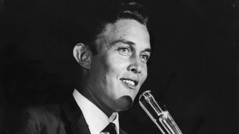 a black and white photo of a young jimmy dean
