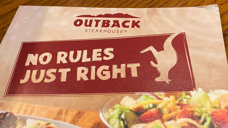 An Outback Steakhouse menu featuring a kangaroo and text that says "No Rules Just Right"