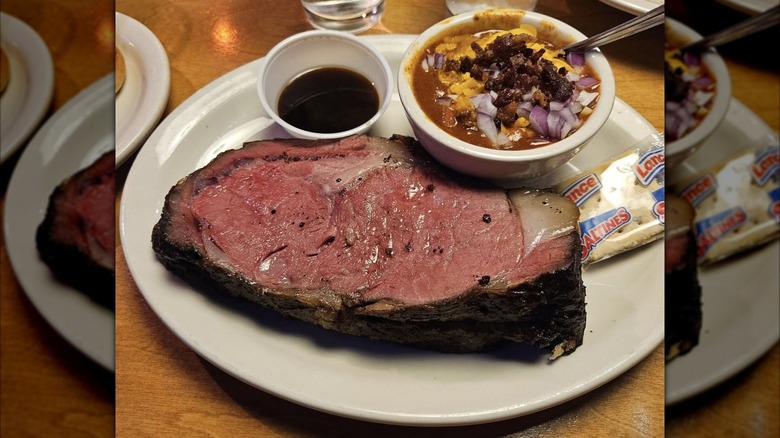 Texas Roadhouse prime rib with a side of chili and au jus