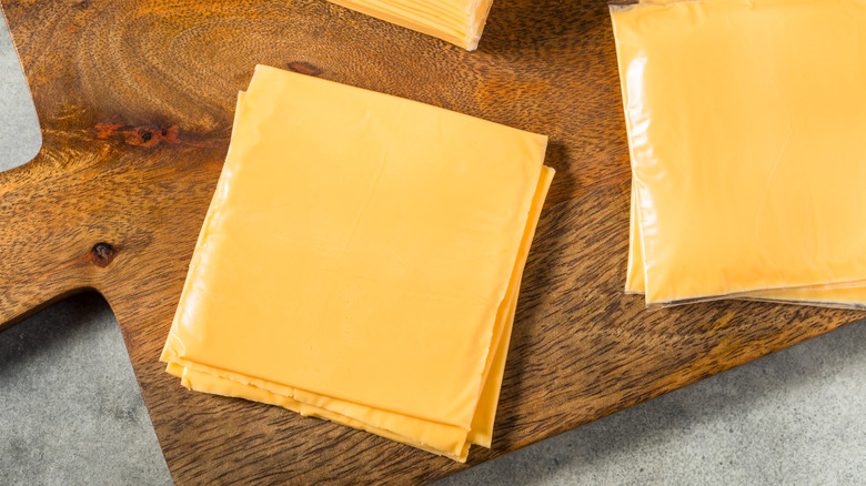 American cheese on a cutting board