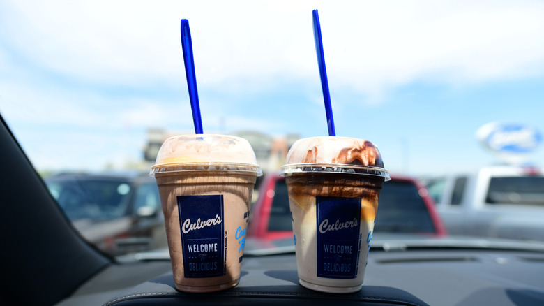 Two Culver's concretes on a car dashboard.