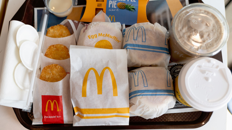 A tray loaded with McDonald's breakfast options