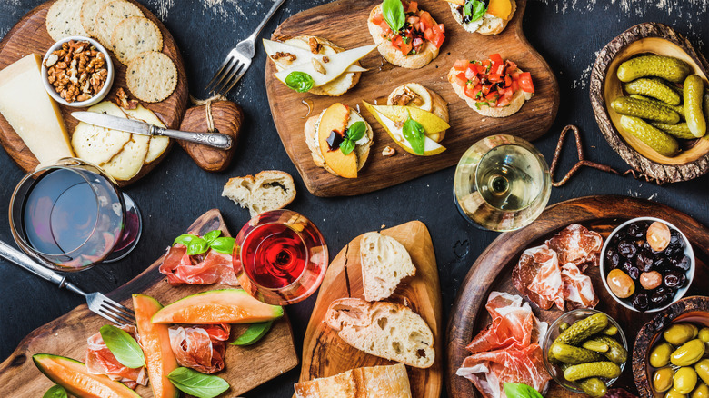 Overhead view of various Italian dishes and appetizers on a table