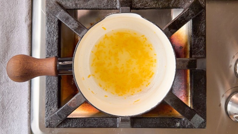 Lemon juice, lemon zest, and salt in small saucepan on stovetop