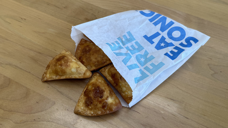 Sonic's Cheesy Garlic Pepperoni Bites in front of Sonic drink cup
