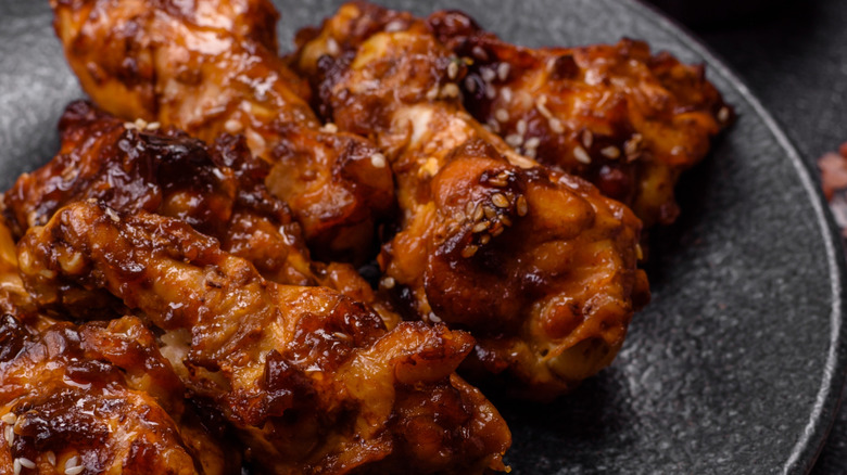close up of marinated sticky wings