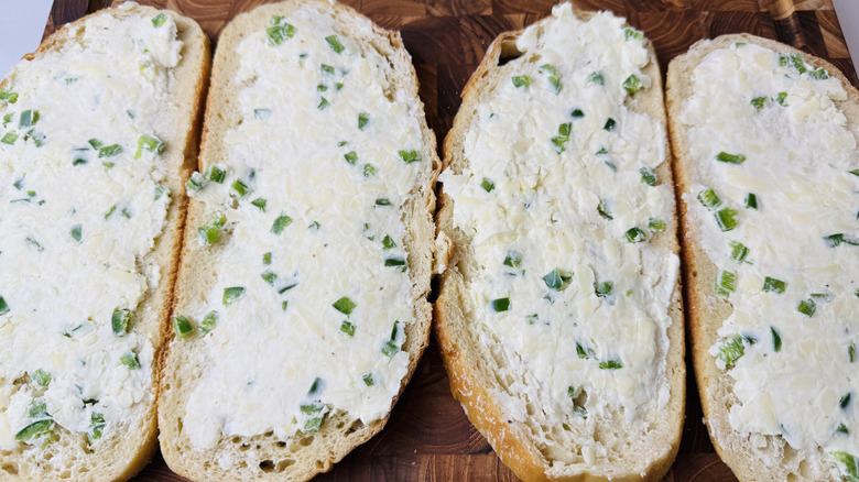 Sourdough bread slices spread with jalapeño cream cheese