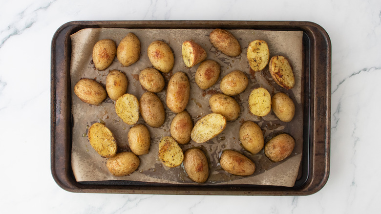 Roasted potatoes on a large baking sheet