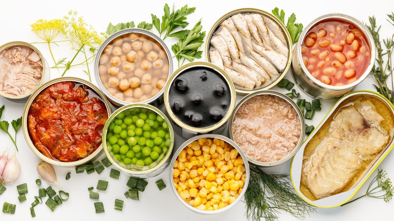 assorted canned goods with open lids