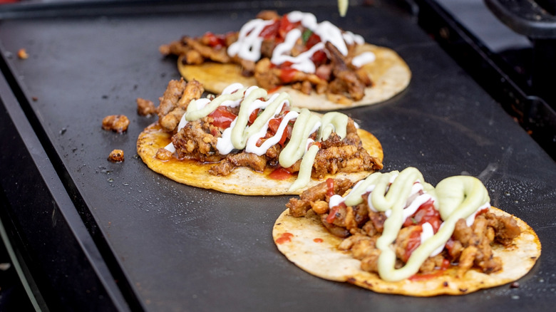 tacos prepared with sauce