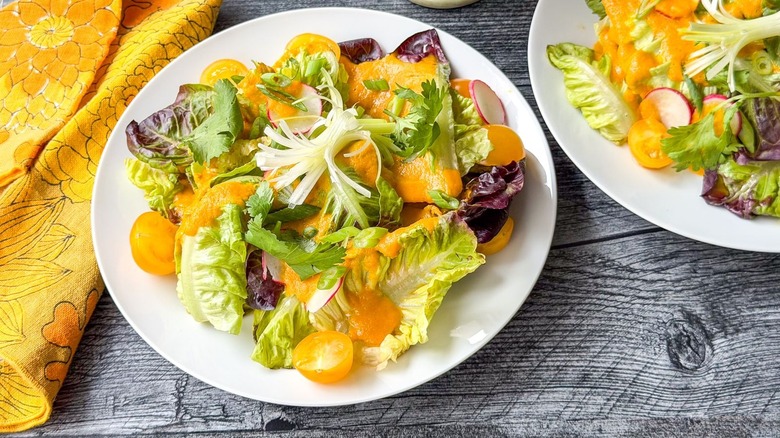 Japanese restaurant-style carrot ginger salad on plates with napkin