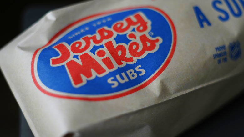 Close-up of a Jersey Mike's sandwich in a wrapper