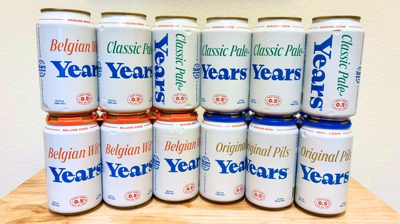 Cans of Years near beers stacked up on top of each other