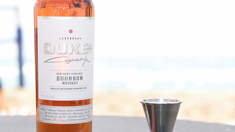 A bottle of Duke Straight Bourbon Whiskey